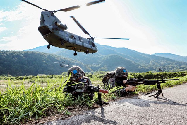 This handout photo taken on August 31, 2023 and provided by the South Korean Defence Ministry shows South Korean soldiers participating in an air assault drill at a training field in Jangseong, as part of the annual Ulchi Freedom Shield joint military drills between South Korea and the United States. (Photo by Handout/South Korean Defence Ministry/AFP Photo)
