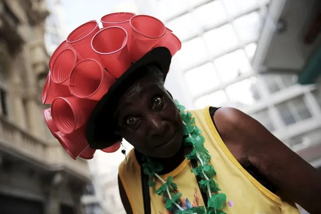 Romilda, 83, a pensioner of a bank, takes part in the annual block party Bloco dos Bancarios, one of the carnival parties in Sao Paulo, Brazil, February 1, 2016. (Photo by Nacho Doce/Reuters)