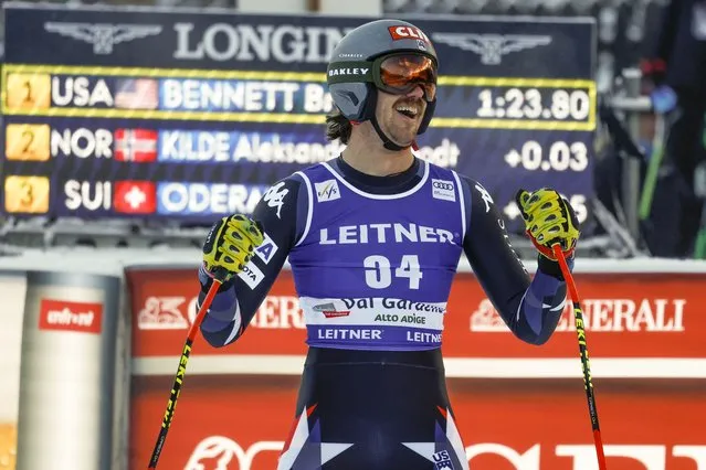 United States' Bryce Bennett celebrates winning an alpine ski, men's World Cup downhill race, in Val Gardena, Italy, Thursday, December 14, 2023. (Photo by Alessandro Trovati/AP Photo)