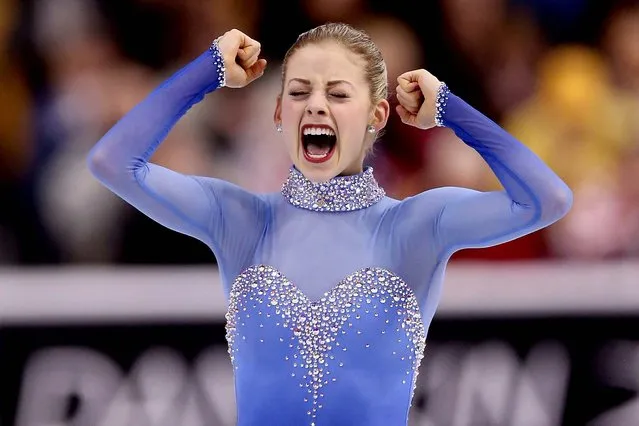 Gracie Gold celebrates at the end of her free skate routine, on January 11, 2014. Gold finished first, Polina Edmunds second and Mirai Nagasu third. (Photo by Matthew Stockman/Getty Images)