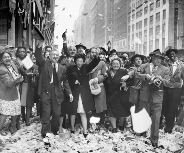 New Yorkers Celebrate -- Paper showers down from office Buildings in the Times Square area, New York, May 7, as New Yorkers cheer the news of Germany's unconditional surrender. May 08, 1945. (Photo by New York Post/Photo Archives, LLC via Getty Images)