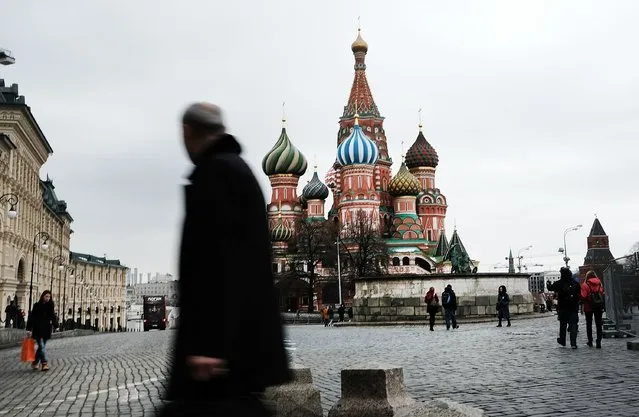 Pedestrians walk through Red Square on March 3, 2017 in Moscow, Russia. (Photo by Spencer Platt/Getty Images)