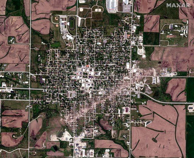 A satellite view shows a tornado scar and damaged buildings in the aftermath of a deadly tornado in Greenfield, Iowa, U.S., May 23, 2024. (Photo by Maxar Technologies/Handout via Reuters)