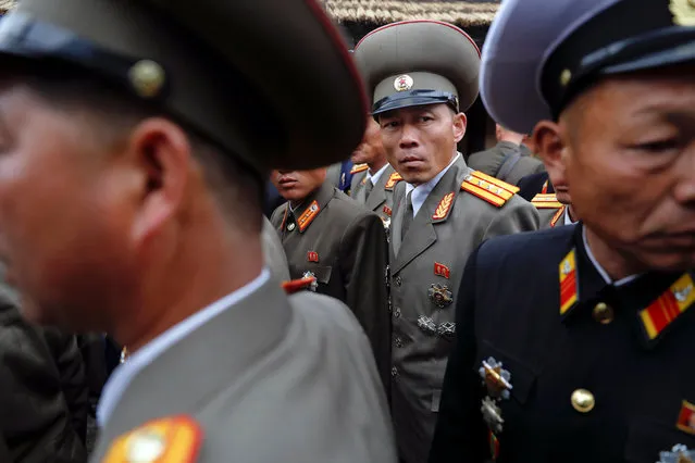 Military officers visit the birthplace of North Korean founder Kim Il Sung, a day before the 105th anniversary of his birth, in Mangyongdae, just outside Pyongyang, North Korea April 14, 2017. (Photo by Damir Sagolj/Reuters)