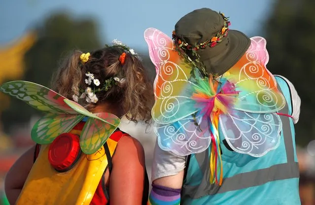 Festivalgoers wear butterfly costumes at Latitude Festival at Henham Park, Britain, July 22, 2021. (Photo by Peter Cziborra/Reuters)