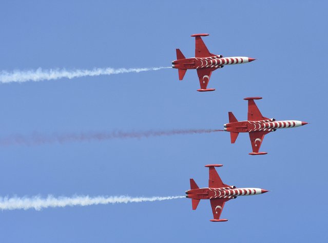 Turkish Stars, the aerobatic demonstration team of the Turkish Air Forces, perform demonstration flight ahead of 19 May Commemoration of Ataturk, Youth and Sports Day in Samsun, Turkiye on May 17, 2024. (Photo by Recep Bilek/Anadolu via Getty Images)