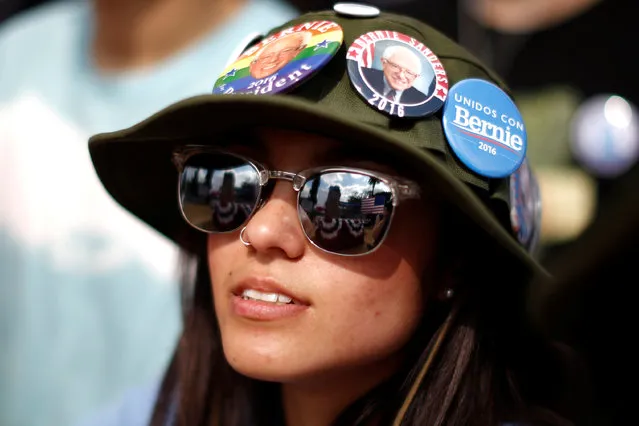 A supporter waits for U.S. Democratic presidential candidate Bernie Sanders to speak in East Los Angeles, California, U.S. May 23, 2016. (Photo by Lucy Nicholson/Reuters)