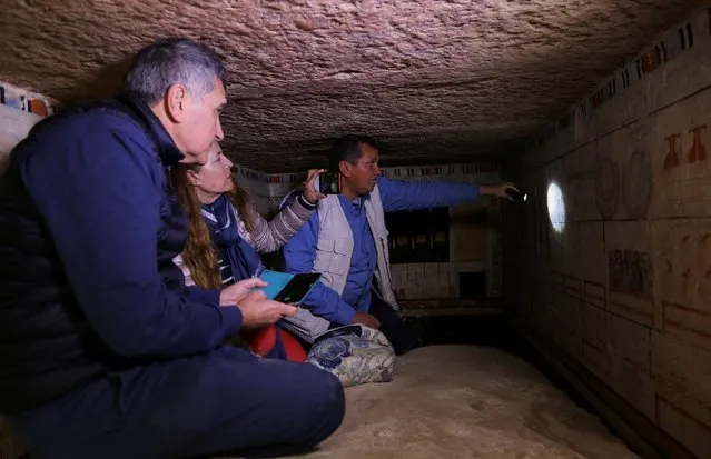Egyptian archaeologist speaks inside the tomb of a woman named Petty who was responsible for the King's beautification and the priest of Hathor, at a recently discovered tomb at the Saqqara area, in Giza, Egypt, March 19, 2022. (Photo by Hanaa Habib/Reuters)