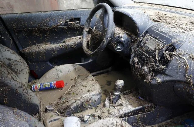 An interior of a car damaged by the floods is pictured in the town of Braunsbach, Germany, May 30, 2016. (Photo by Kai Pfaffenbach/Reuters)