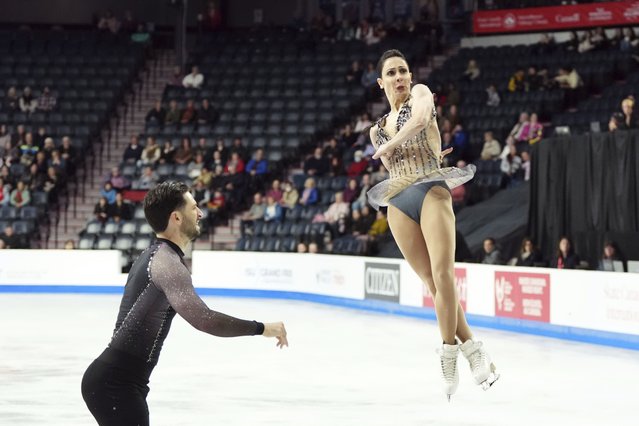 Deanna Stellato-Dudek, right, and Maxime Deschamps, left, of Canada, compete in the pairs short program at the Skate Canada International figure skating competition in Halifax, Nova Scotia, Friday, October 25, 2024. (Photo by Darren Calabrese/The Canadian Press via AP Photo)