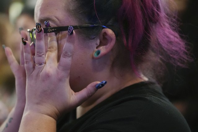 Emmie Reed, center, co-founder of Bans Off Our Bodies Florida collective, wipes away tears after Florida's Amendment 4, which would have enshrined abortion rights in the state, fell short of the 60% vote threshold required to pass, during a watch party for the Yes On 4 campaign, on Election Day, Tuesday, November 5, 2024, in St. Petersburg, Fla. (Photo by Rebecca Blackwell/AP Photo)