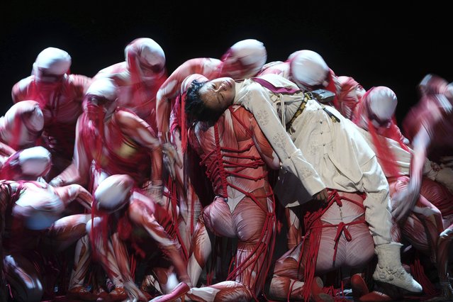 Artists perform a scene from the Mongol Khan production during the rehearsal in London, Friday, November 17, 2023. Mongolia's leading theatre company production is the first ever visit to the UK, will show at the London Coliseum on Nov. 17. (Photo by Kin Cheung/AP Photo)