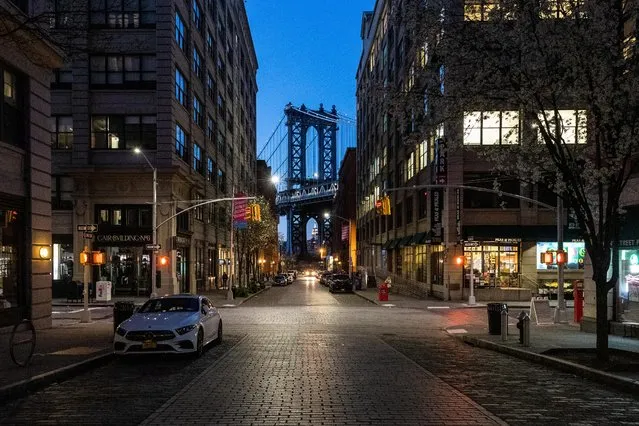 An empty Dumbo is seen during the outbreak of the coronavirus disease (COVID-19) in Brooklyn, New York City, U.S., March 27, 2020. (Photo by Jeenah Moon/Reuters)