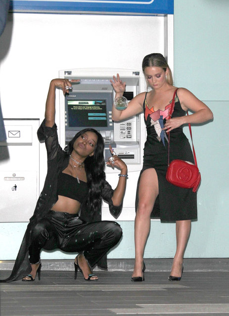 Billie Catherine Lourd and Keke Palmer must have loved their account balances so much, they posed in front of an ATM in Los Angeles on August 8, 2016. (Photo by Jen Lowery/Splash News)