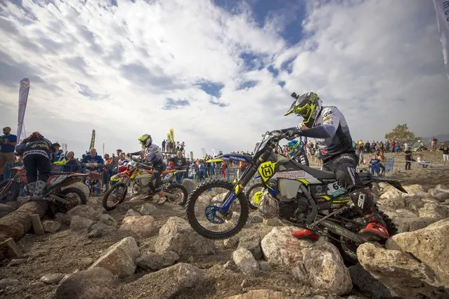 Artur Orchowski (R) of Poland prepares to compete in the beach stage of the 13th Sea To Sky Enduro Races in Kemer district of Turkiye's Antalya on October 19, 2022. (Photo by Mustafa Ciftci/Anadolu Agency via Getty Images)