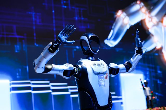A humanoid robot performs after the opening ceremony of the 2025 Zhongguancun Forum (ZGC Forum) in Beijing, China, 27 March, 2025. The 2025 Zhongguancun Forum (ZGC Forum) is to take place in Beijing from 27-31 March and centers on the theme “New Quality Productive Forces and Global Technological Cooperation”. (Photo by Wu Hao/EPA)