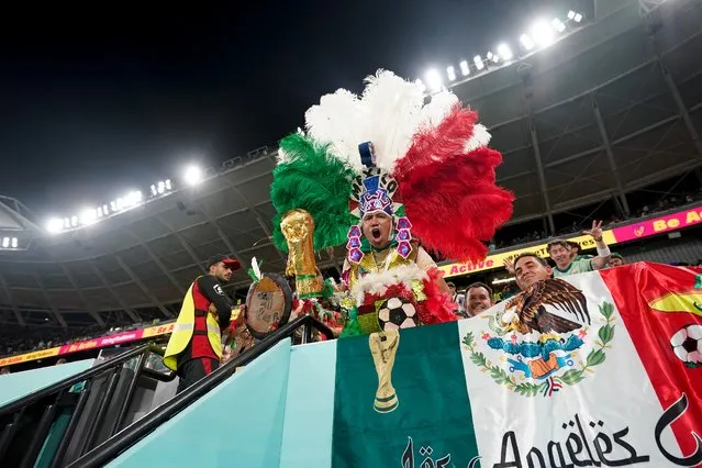 A Mexican soccer fan poses for a picture prior to the World Cup group C soccer match between Mexico and Poland, at the Stadium 974 in Doha, Qatar, Tuesday, November 22, 2022. (Photo by Moises Castillo/AP Photo)
