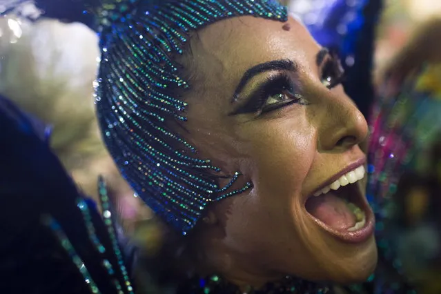 Drum queen Sabrina Sato from the Unidos de Vila Isabel samba school parades during Carnival celebrations at the Sambadrome in Rio de Janeiro, Tuesday, February 12, 2013. Rio de Janeiro's samba schools vied for the title of the year's best in an over-the-top, all-night-long Carnival parade at the city's iconic Sambadrome. (Photo by Felipe Dana/AP Photo)