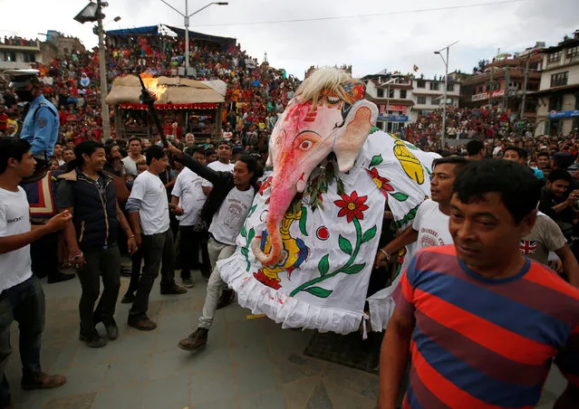 The elephant deity “Pulukishi” is paraded during the Indra Jatra festival in Kathmandu, Nepal September 15, 2016. (Photo by Navesh Chitrakar/Reuters)