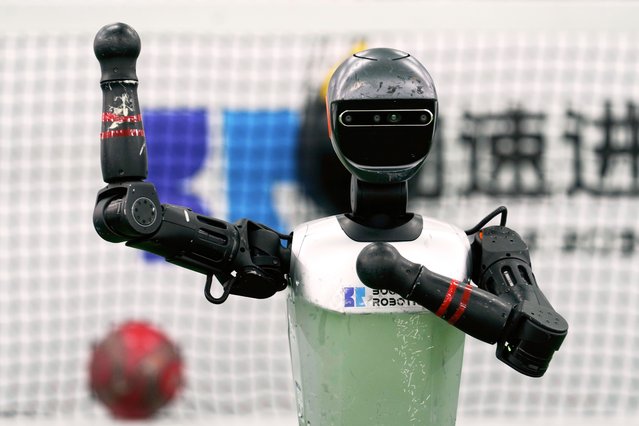 A K1 robot from Booster Robotics operates before leaving for the Brazil Robocup at a pre-competition exploration camp in Beijing, Wednesday, July 9, 2025. (Photo by Mahesh Kumar A./AP Photo)