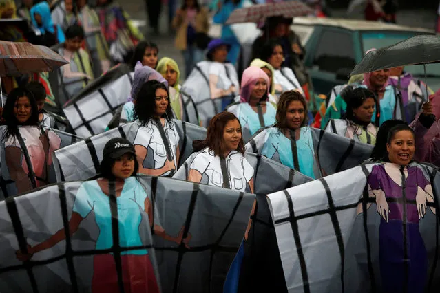 Pro-abortion activists wearing ponchos with illustrations of women in jail, demonstrate to demand the decriminalization of abortion in Mexico City, Mexico September 28, 2016. (Photo by Carlos Jasso/Reuters)