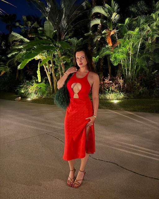 American actress Bella Thorne is “testing out the red dress theory” on November 10, 2025. (Photo by bellathorne/Instagram)