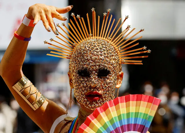 A participant marches during the Tokyo Rainbow Pride parade, celebrating advances in LGBTQ rights and calling for marriage equality, in Tokyo, Japan on April 23, 2023. (Photo by Issei Kato/Reuters)