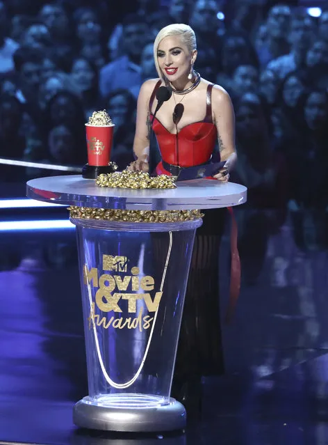 In this Saturday, June 16, 2018, photo, Lady Gaga presents the award for best movie at the MTV Movie and TV Awards at the Barker Hangar in Santa Monica, Calif. (Photo by Matt Sayles/Invision/AP Photo)