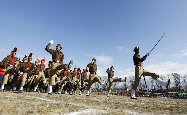 Indian policemen march during a Republic Day parade in Srinagar January 26, 2015. (Photo by Danish Ismail/Reuters)