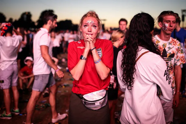 England football fans react after their defeat as they watch the Hyde Park screening of the FIFA 2018 World Cup semi-final match between Croatia and England on July 11, 2018 in London, United Kingdom.The winner of this evening's match will go on to play France in Sunday's World Cup final in Moscow. Up to 30,000 free tickets were available by ballot for the biggest London screening of a football match since 1996. (Photo by Jack Taylor/Getty Images)