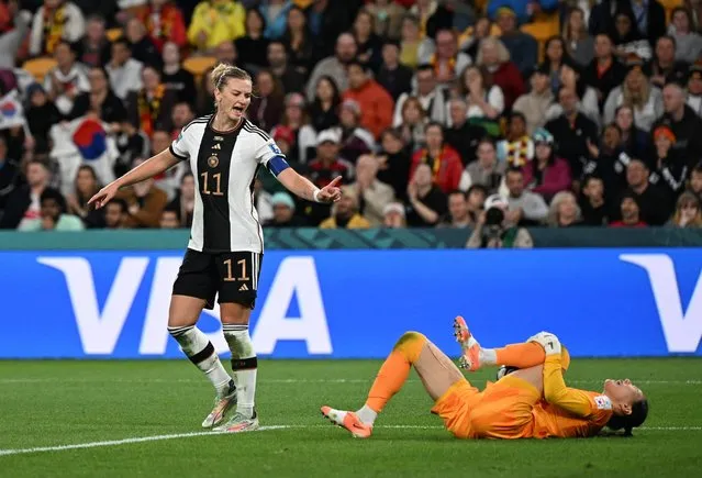 South Korea's Kim Jung-mi and Germany's Alexandra Popp react during the FIFA Women's World Cup Australia & New Zealand 2023 Group H match between South Korea and Germany at Brisbane Stadium on August 03, 2023 in Brisbane, Australia. (Photo by Dan Peled/Reuters)
