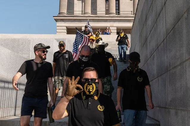 Members of the Proud Boys gather in front of the Tennessee State Capitol ahead of a special session on public safety in Nashville, Tennessee, U.S., August 21, 2023. (Photo by Cheney Orr/Reuters)