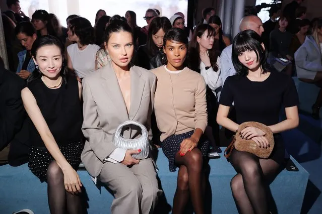(2nd L-R) Brazilian model Adriana Lima, Vincent Cassel's wife Tina Kunakey and Japanese singer Momo attend the Miu Miu Womenswear S/S 2024 show as part of Paris Fashion Week at Palais d'Iena on October 03, 2023 in Paris, France. (Photo by Victor Boyko/Getty Images for Miu Miu)