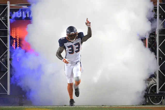 Orlando Apollos safety Will Hill III runs onto the field during player introductions for the team's Alliance of American Football game against the Atlanta Legends on Saturday, February 9, 2019, in Orlando, Fla. (Photo by Phelan M. Ebenhack/AP Photo)