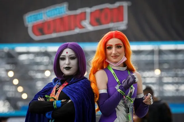 A women in costume pose together at the 2021 New York Comic Con,at the Jacob Javits Convention Center in Manhattan in New York City, New York, U.S., October 7, 2021. (Photo by Brendan McDermid/Reuters)