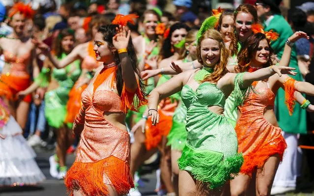 Dancers take part in the Karneval der Kulturen (Carnival of Cultures) street parade of ethnic minorities, in Berlin, Germany, May 24, 2015. (Photo by Hannibal Hanschke/Reuters)