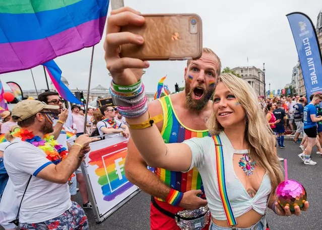James Haskell and Chloe Madeley taking a selfie in front of the crowd  in the annual Pride Parade in London on July 6, 2019. (Photo by Guy Bell/Rex Features/Shutterstock)