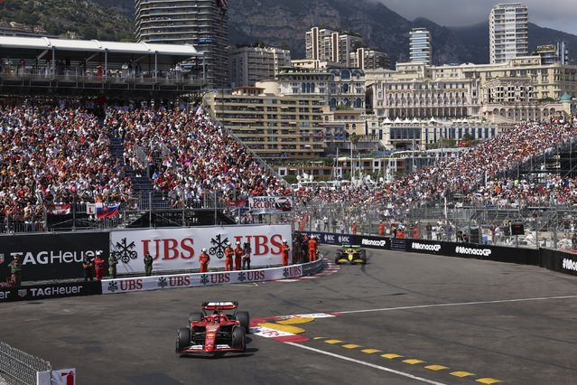 Ferrari driver Charles Leclerc of Monaco leads the field after the restart the Formula One Monaco Grand Prix race at the Monaco racetrack, in Monaco, Sunday, May 26, 2024. (Photo by Luca Bruno/AP Photo)