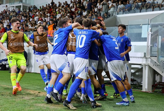 Players of Italy celebrate after scoring the opening goal during the UEFA Under-17 final between Italy and Portugal in Limassol, Cyprus, 05 June 2024. (Photo by Chara Savvides/EPA)