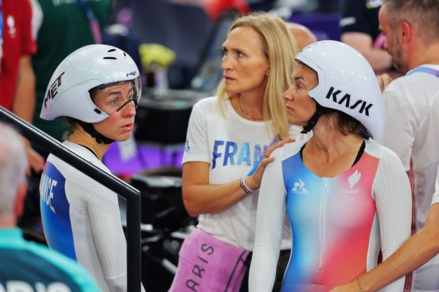 Anne-Sophie Centis and pilot Élise Delzenne of France look dejected after finding out they would not be allowed to restart despite an issue at the beginning of their qualifying run at the National Velodrome on day four of the Paris 2024 Summer Paralympic Games on Sunday, September 1, 2024. (Photo by Alex Whitehead/SWpix.com/Rex Features/Shutterstock)