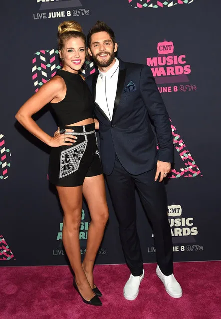 Singer-songwriter Thomas Rhett (R) and wife Lauren Gregory attends the 2016 CMT Music awards at the Bridgestone Arena on June 8, 2016 in Nashville, Tennessee. (Photo by Rick Diamond/Getty Images  for CMT)
