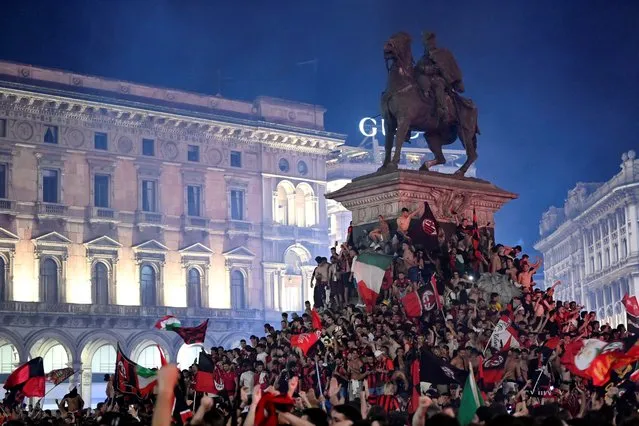 AC Milan fans celebrate after winning the Serie A title, in Milan, Italy.on May 22, 2022. (Photo by Flavio Lo Scalzo/Reuters)