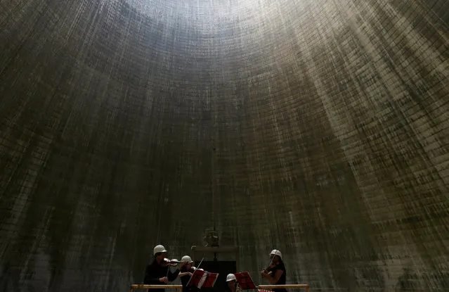 The South Bohemian Philharmonic Quartet performs inside a cooling tower at Temelin nuclear power plant near the town of Tyn nad Vltavou, Czech Republic, June 20, 2016. (Photo by David W. Cerny/Reuters)