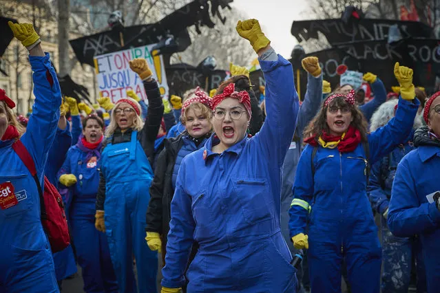 Members of the CGT Union dressed as traditional cleaners perform a flash dance near Place de la Republique on January 24, 2020 in Paris, France. The day marks the 51st consecutive day of strikes and the 7th day of national strike dubbed “Black Friday” by the CFE-CGC, CGT, FO, FSU Unions organising the strikes and calling for a massive protest against President Macron’s controversial pension reform on the day that it is formally presented in the Council of Ministers. (Photo by Kiran Ridley/Getty Images)