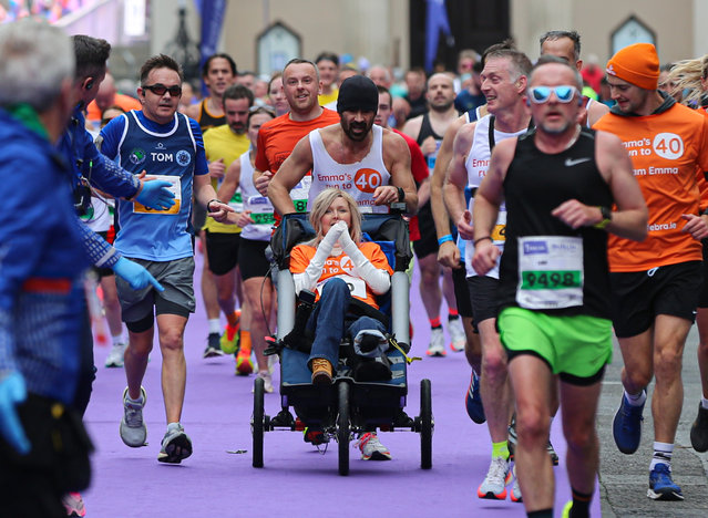 The actor Colin Farrell and his friend Emma Fogarty take part in the city’s marathon to raise money for people living with epidermolysis bullosa, a rare genetic skin condition suffered by Fogarty in Dublin, Ireland on October 27, 2024. (Photo by Damien Storan/PA Wire)