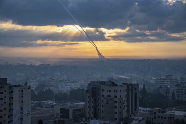 Rockets are fired toward Israel from the Gaza Strip, Saturday, October 7, 2023. The rockets were fired as Hamas announced a new operation against Israel. (Photo by Fatima Shbair/AP Photo)