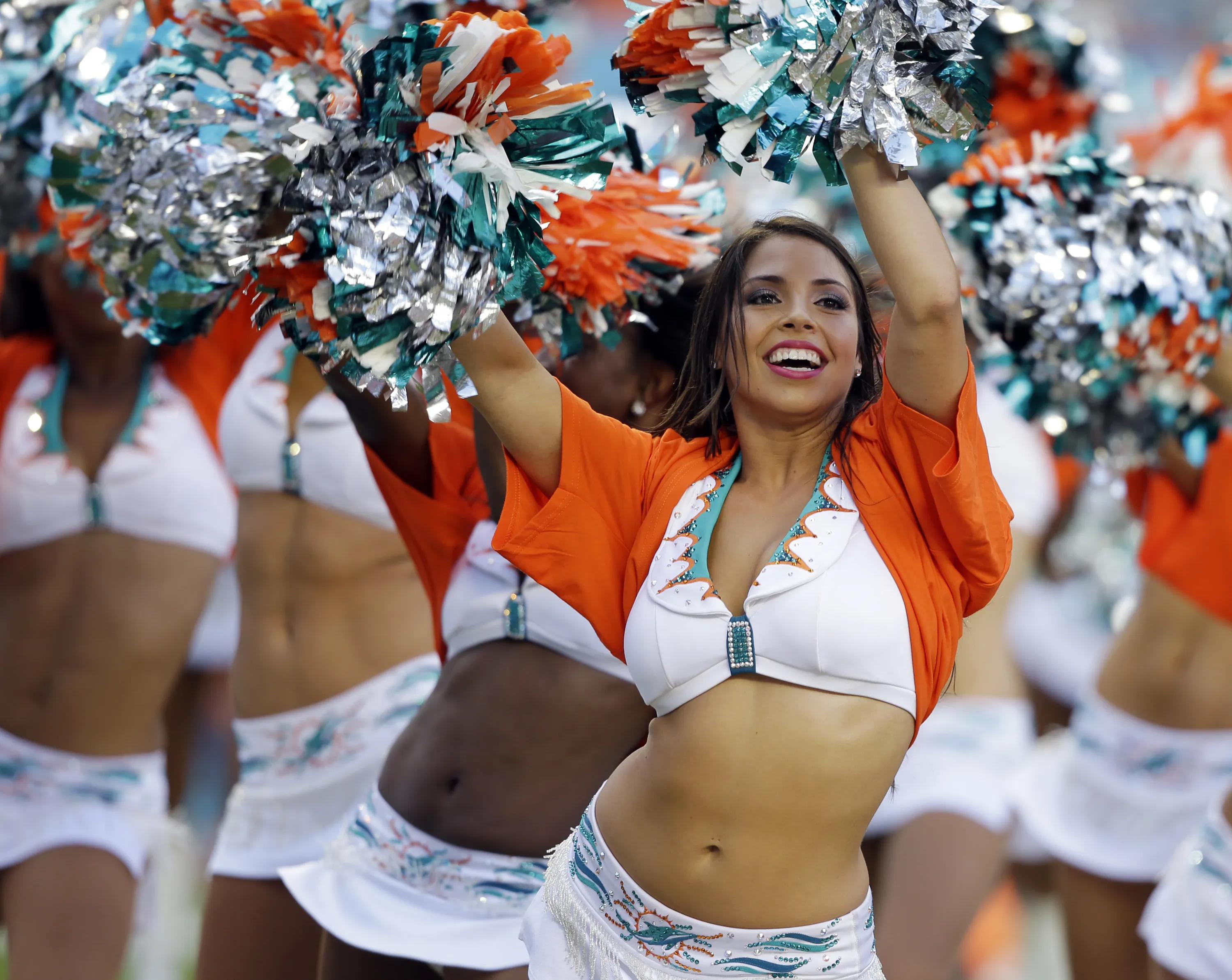 Miami Dolphins cheerleaders perform during the first half of an NFL footbal...