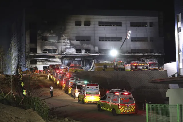 Emergency ambulances line up in front of a construction site in Icheon, South Korea, Wednesday, April 29, 2020. One of the South Korea's worst fires in years broke out at the construction site. (Photo by Lee Jong-hoon/Yonhap via AP Photo)