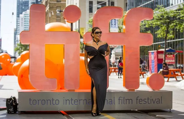 Rosario Vega poses in front of a giant TIFF sign on King St during the 40th Toronto International Film Festival in Toronto, Canada, September 10, 2015. TIFF runs from September 10-20. (Photo by Mark Blinch/Reuters)