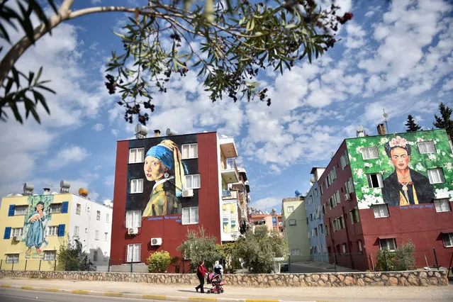 An artwork is drawn on the wall of a building in Mersin province of Turkey on November 13, 2017. Artworks of world famous artists; like Vincent Van Gogh, Osman Hamdi Bey, Pablo Picasso or Salvador Dali are drawn on the walls of buildings at a boulevard, by a painter Nazife Bilgin Hazar as part of the project of Toroslar Municipality of Mersin. (Photo by Sezgin Pancar/Anadolu Agency/Getty Images)